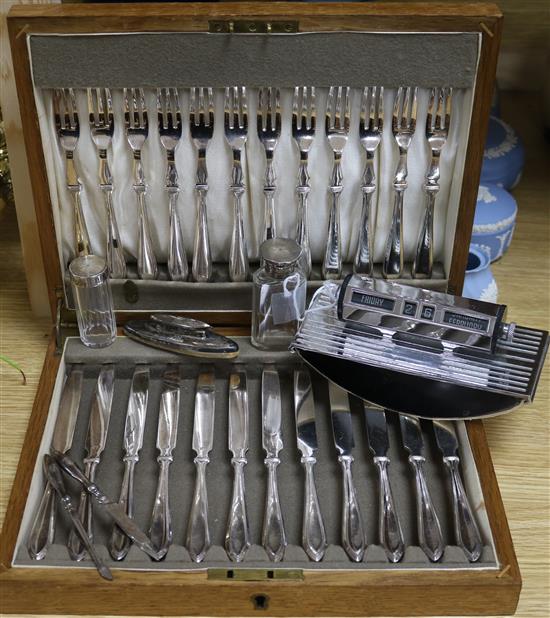 Twelve pairs of Roberts & Belk plated fruit eaters, cased, an Art Deco chromed desk calendar-cum-blotter and sundries,